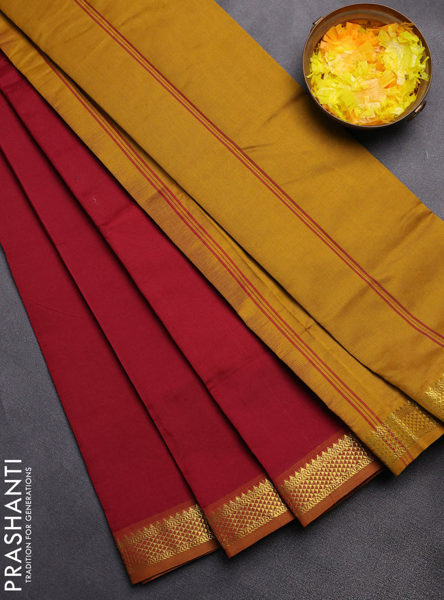 Semi silk cotton saree maroon and mustard yellow with plain body and zari woven border