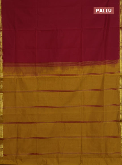Semi silk cotton saree maroon and mustard yellow with plain body and zari woven border