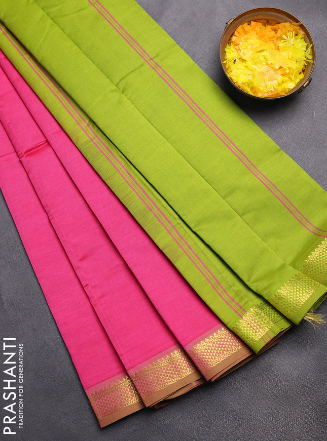 Semi silk cotton saree pink and light green with plain body and zari woven border