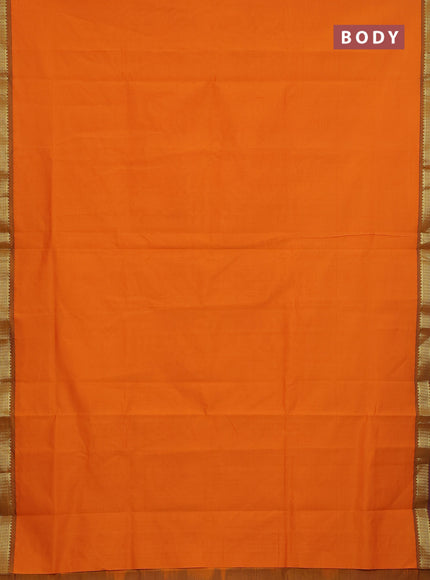 Semi silk cotton saree orange and blue with plain body and zari woven border