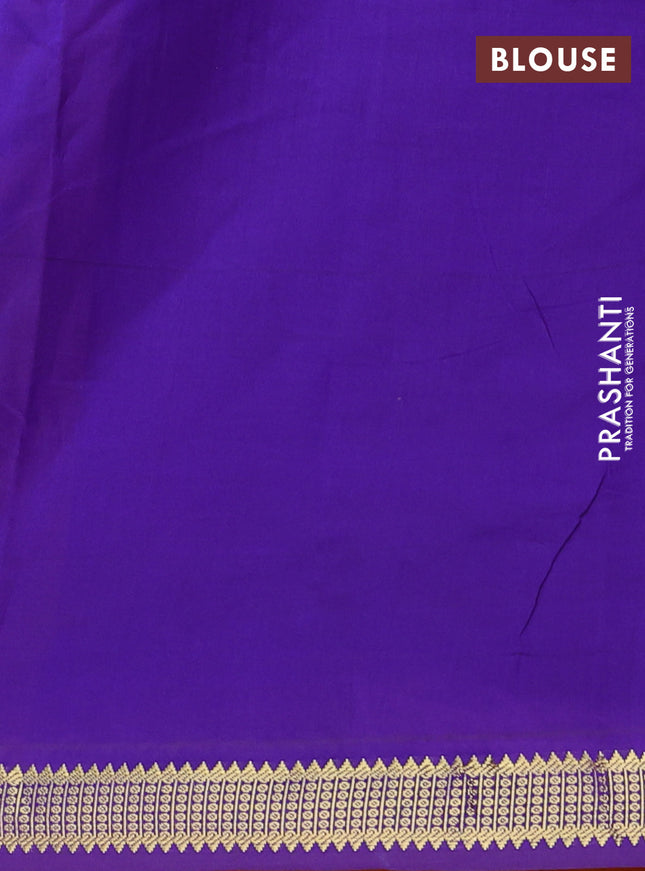 Semi silk cotton saree orange and blue with plain body and zari woven border