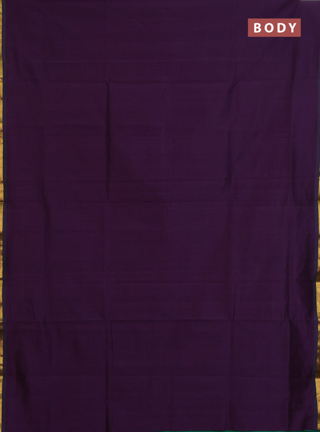 Semi silk cotton saree purple and green with plain body and zari woven border