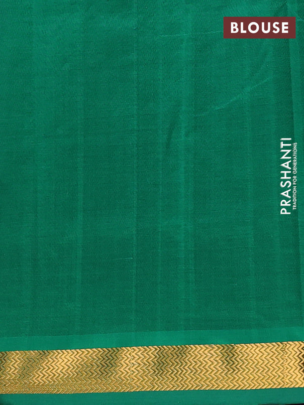 Semi silk cotton saree purple and green with plain body and zari woven border