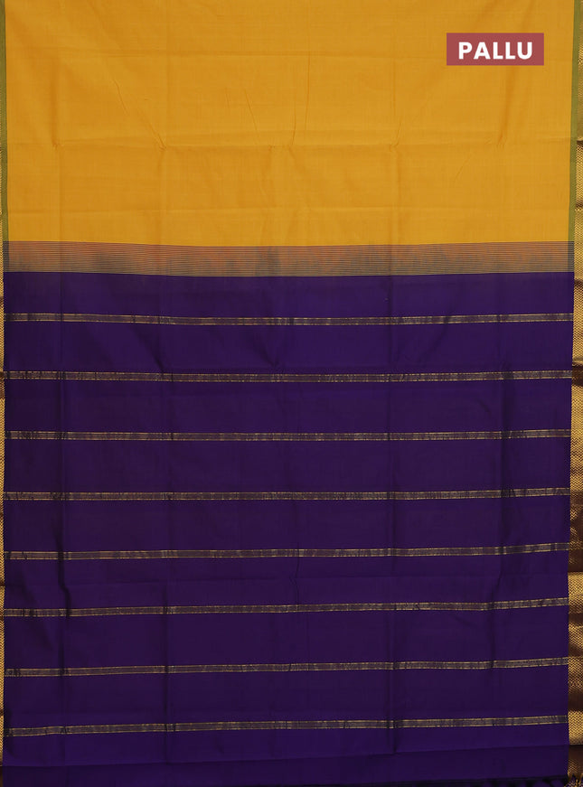 Semi silk cotton saree yellow and violet with plain body and zari woven border