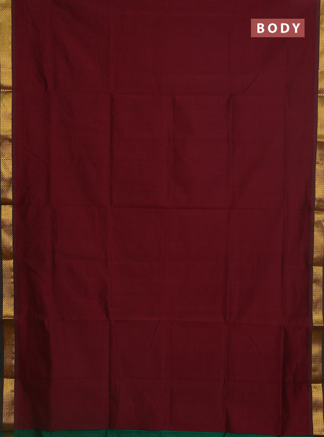Semi silk cotton saree maroon and green with plain body and zari woven border