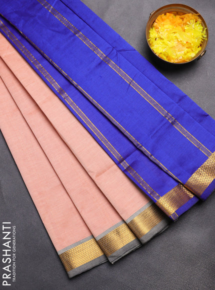 Semi silk cotton saree peach orange and blue with plain body and zari woven border