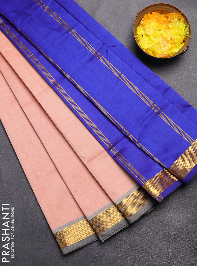Semi silk cotton saree peach orange and blue with plain body and zari woven border