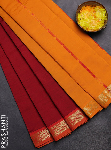 Semi silk cotton saree maroon and mustard yellow with plain body and zari woven border