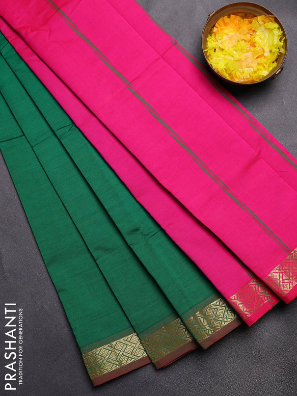 Semi silk cotton saree green and pink with plain body and zari woven border