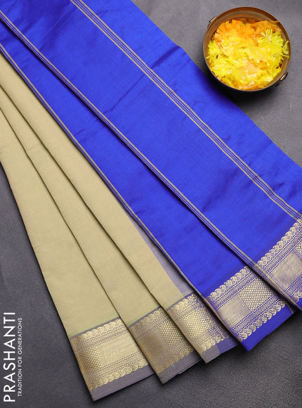 Semi silk cotton saree mild pista green and blue with plain body and zari woven border