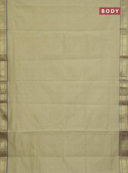 Semi silk cotton saree mild pista green and blue with plain body and zari woven border