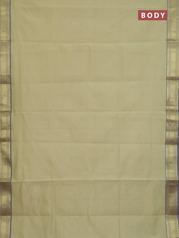 Semi silk cotton saree mild pista green and blue with plain body and zari woven border