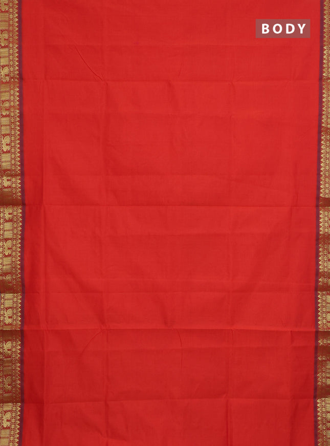 Semi silk cotton saree orange and blue with plain body and zari woven border