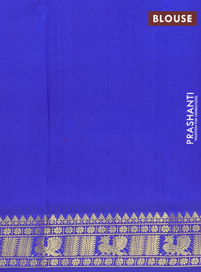 Semi silk cotton saree orange and blue with plain body and zari woven border