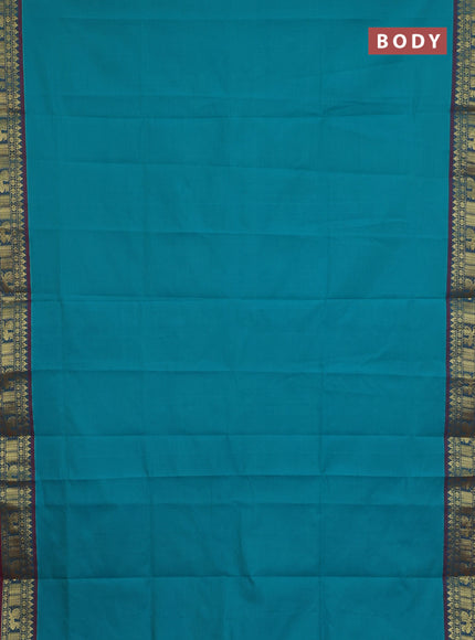Semi silk cotton saree teal blue and red with plain body and zari woven border