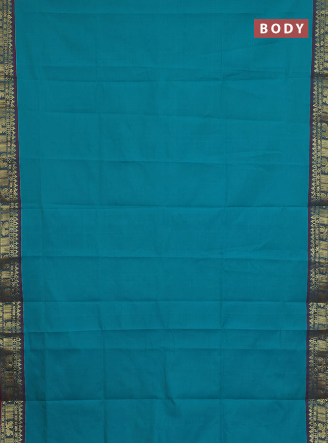 Semi silk cotton saree teal blue and red with plain body and zari woven border