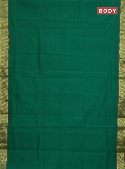 Semi silk cotton saree green and rust shade with plain body and zari woven border