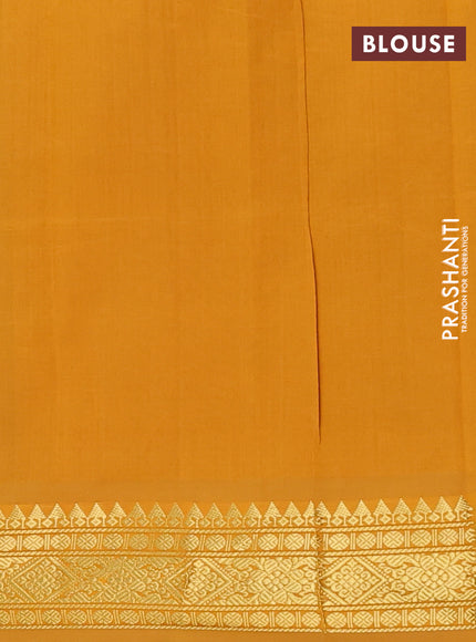 Semi silk cotton saree green and dark mustard with plain body and zari woven border