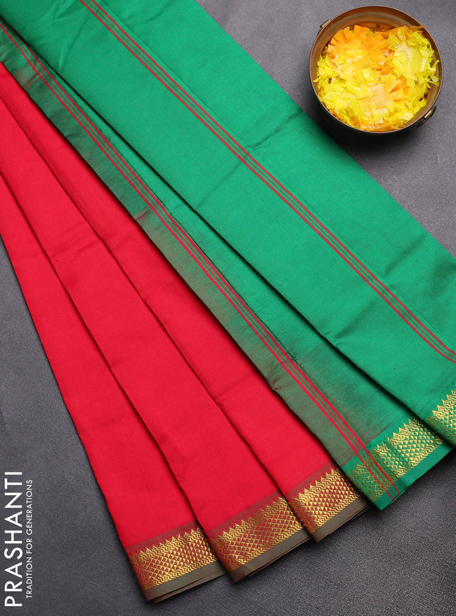 Semi silk cotton saree red and green with plain body and zari woven border