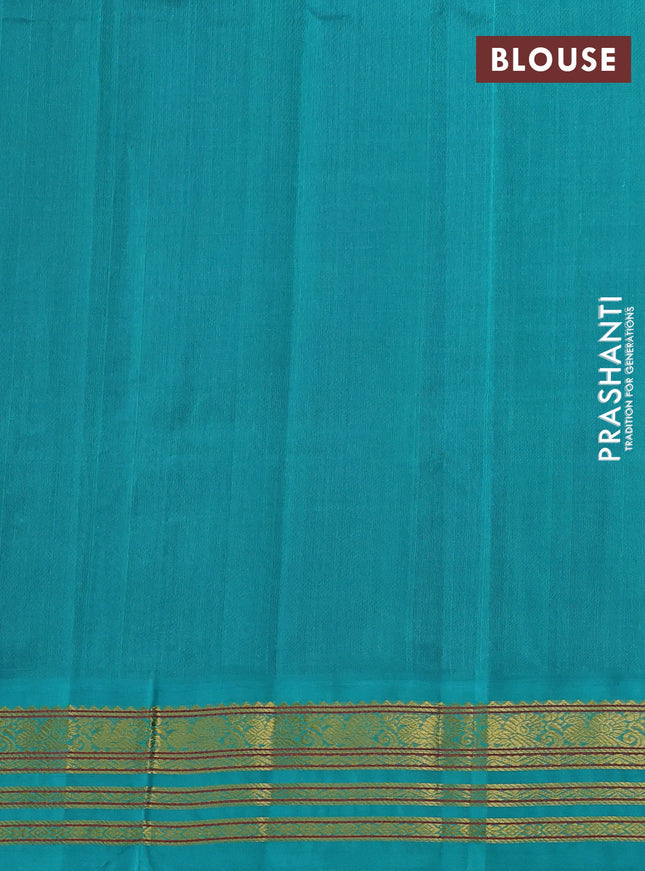 Silk cotton saree blue and teal green with plain body and zari woven korvai border