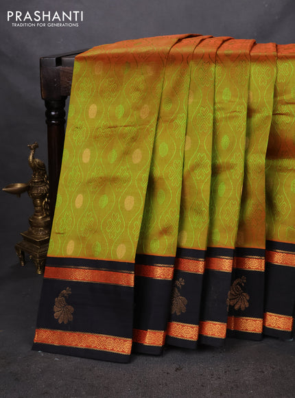 Silk cotton saree dual shade of green and black with allover self emboss jacquard and rettapet zari woven Korvai border
