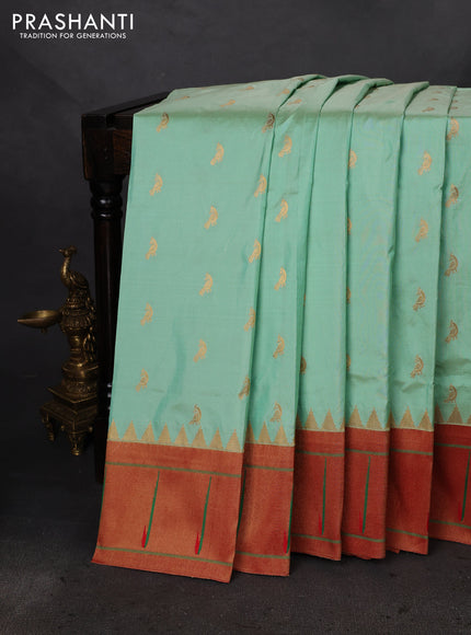 Pure paithani silk saree pista green and red with allover peacock zari woven buttas and zari woven muniya butta border