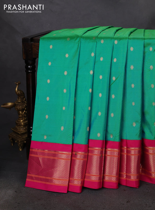 Pure paithani silk saree dual shade of teal bluish green and pink with allover zari woven buttas and paithani weaving pallu