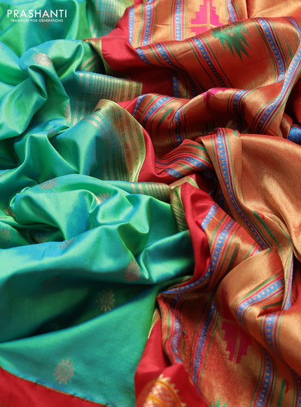 Pure paithani silk saree dual shade of teal bluish green and red with allover zari woven buttas and paithani weaving pallu