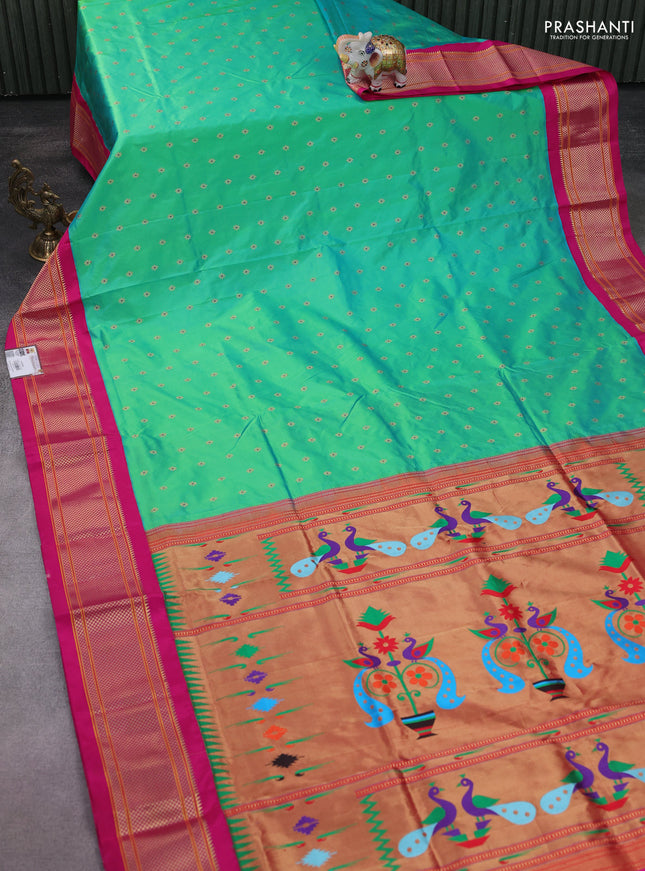 Pure paithani silk saree dual shade of teal bluish green and pink with allover zari woven buttas and paithani weaving pallu