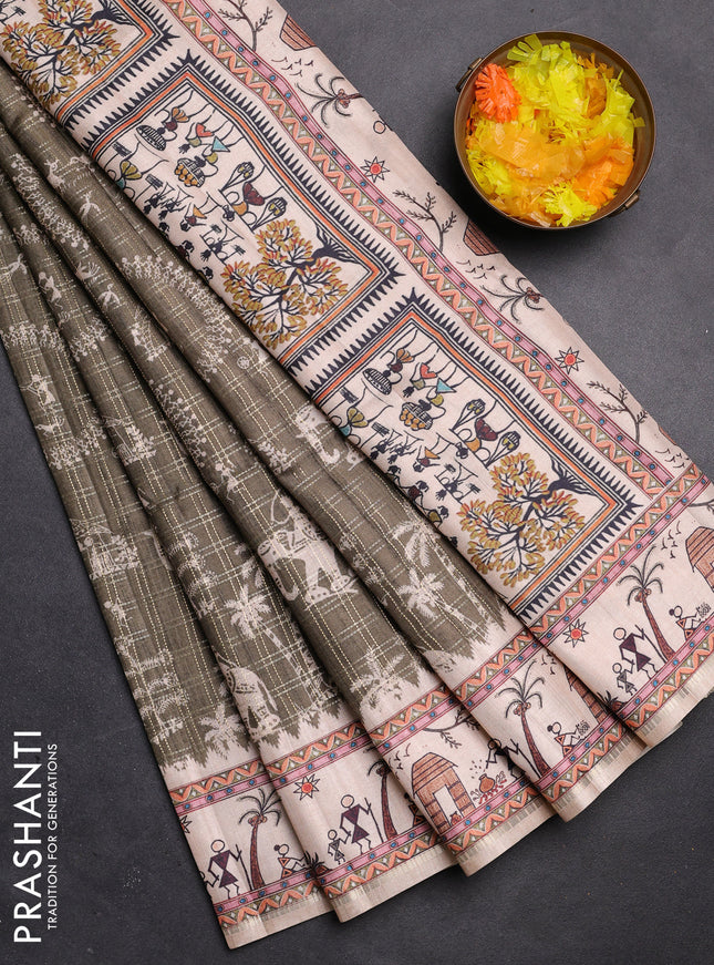 Semi tussar saree sap green and cream with allover zari checks & warli prints  and printed border
