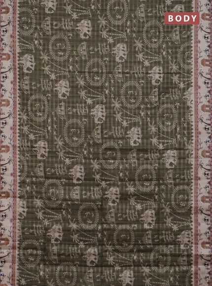 Semi tussar saree sap green and cream with allover zari checks & warli prints  and printed border