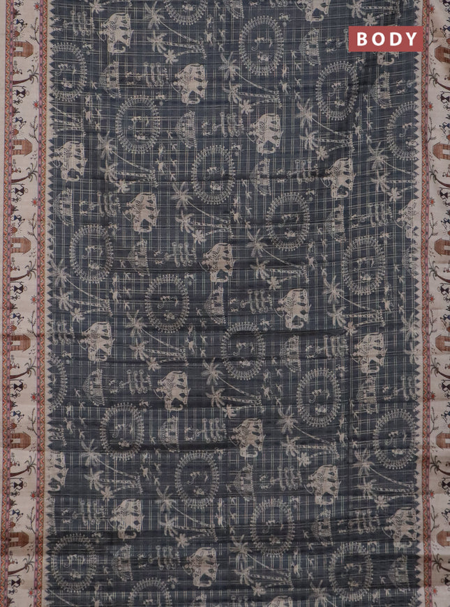 Semi tussar saree green and cream with allover zari checks & warli prints  and printed border