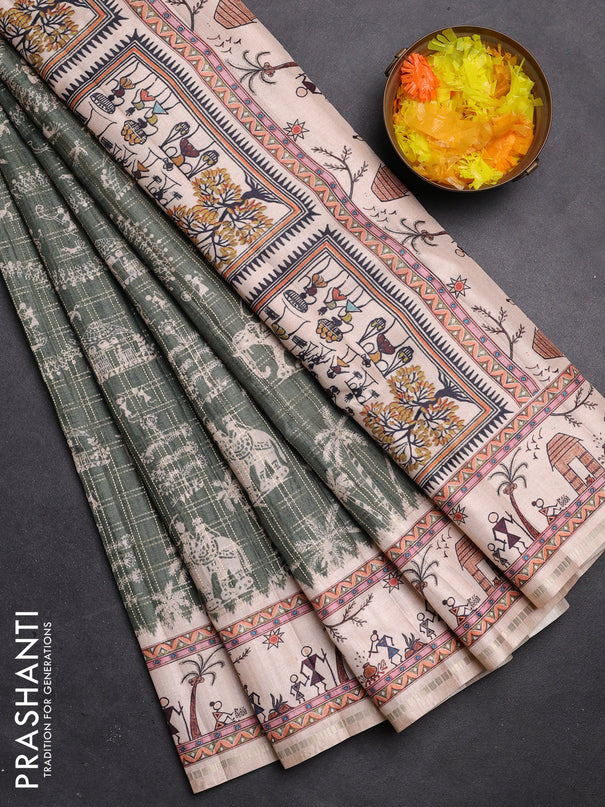 Semi tussar saree sap green and cream with allover zari checks & warli prints  and printed border