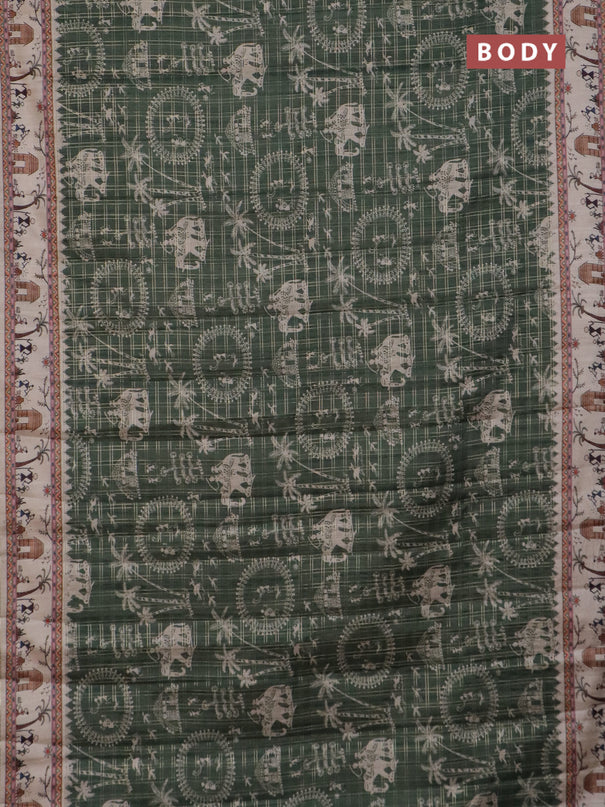 Semi tussar saree sap green and cream with allover zari checks & warli prints  and printed border