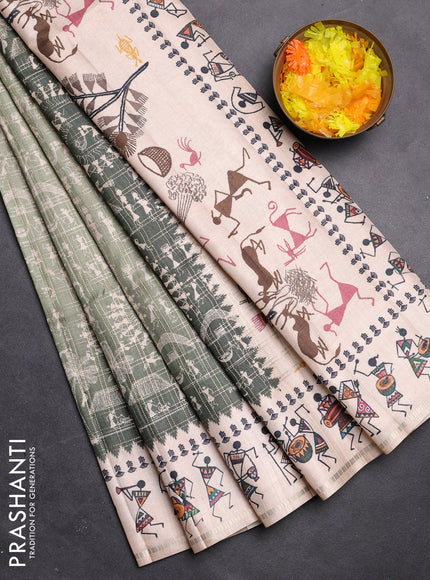 Semi tussar saree pastel green and cream with allover zari checks & warli prints  and printed border