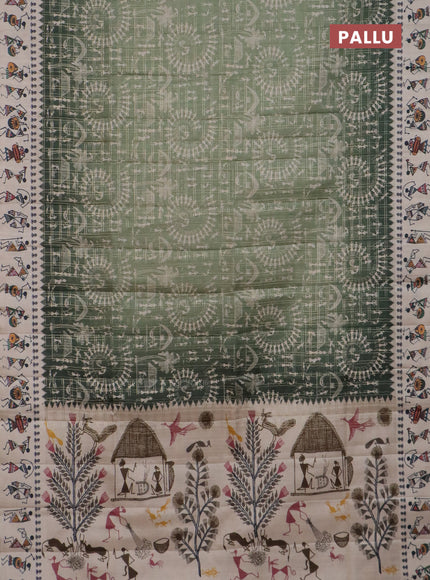 Semi tussar saree pastel green and cream with allover zari checks & warli prints  and printed border
