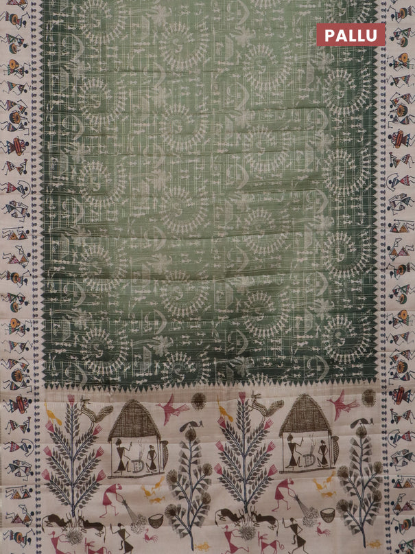 Semi tussar saree pastel green and cream with allover zari checks & warli prints  and printed border