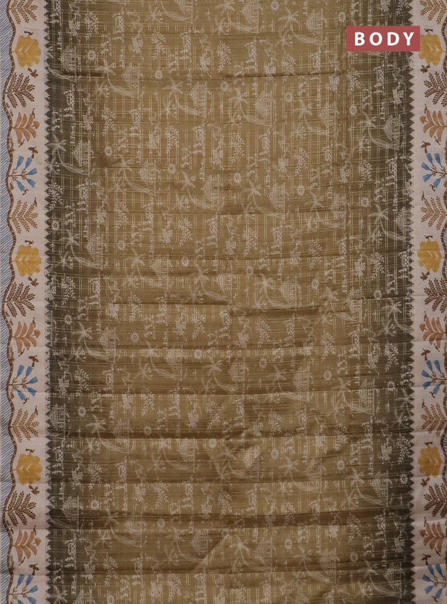 Semi tussar saree mehendi green and cream with allover zari checks & warli prints  and printed border