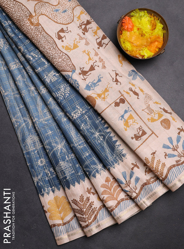 Semi tussar saree blue and cream with allover zari checks & warli prints  and printed border