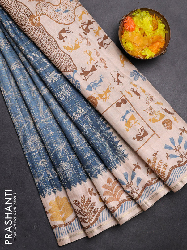 Semi tussar saree blue and cream with allover zari checks & warli prints  and printed border