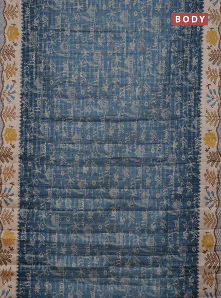 Semi tussar saree blue and cream with allover zari checks & warli prints  and printed border