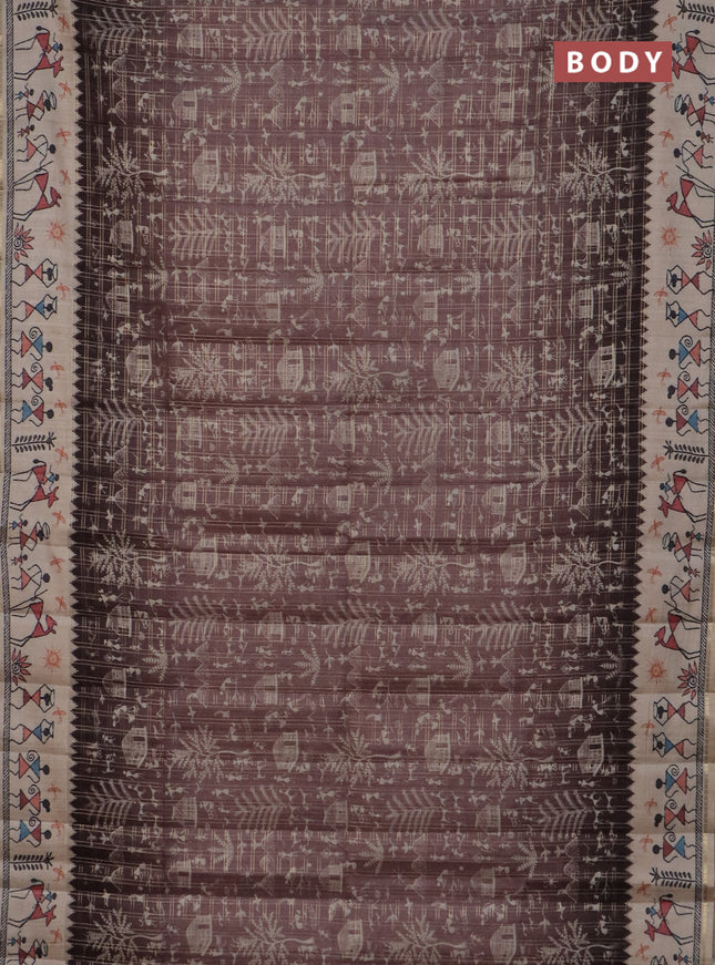 Semi tussar saree pastel brown and cream with allover zari checks & warli prints  and printed border