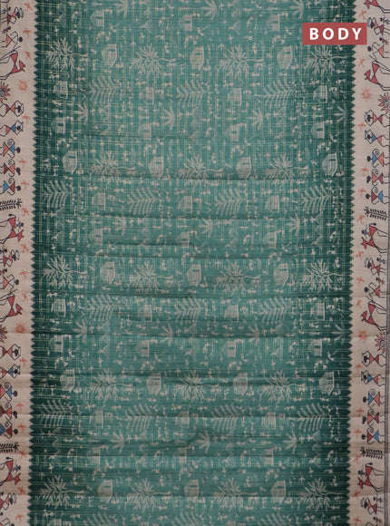 Semi tussar saree teal green and cream with allover zari checks & warli prints  and printed border