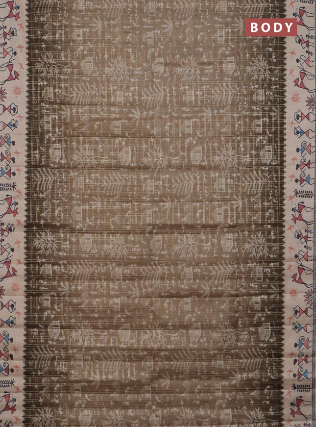 Semi tussar saree sap green and cream with allover zari checks & warli prints  and printed border