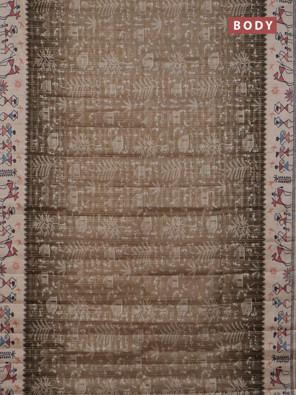 Semi tussar saree sap green and cream with allover zari checks & warli prints  and printed border