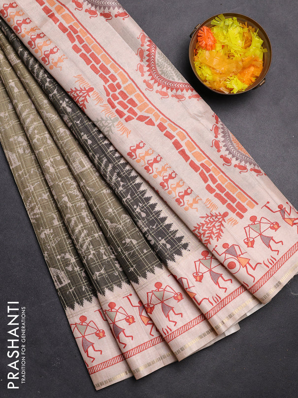 Semi tussar saree sap green and cream with allover zari checks & warli prints  and printed border