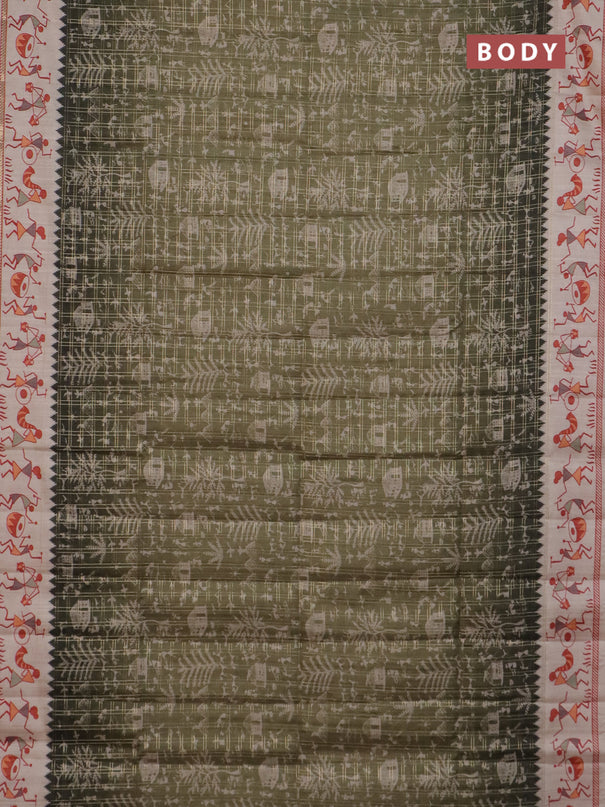 Semi tussar saree sap green and cream with allover zari checks & warli prints  and printed border