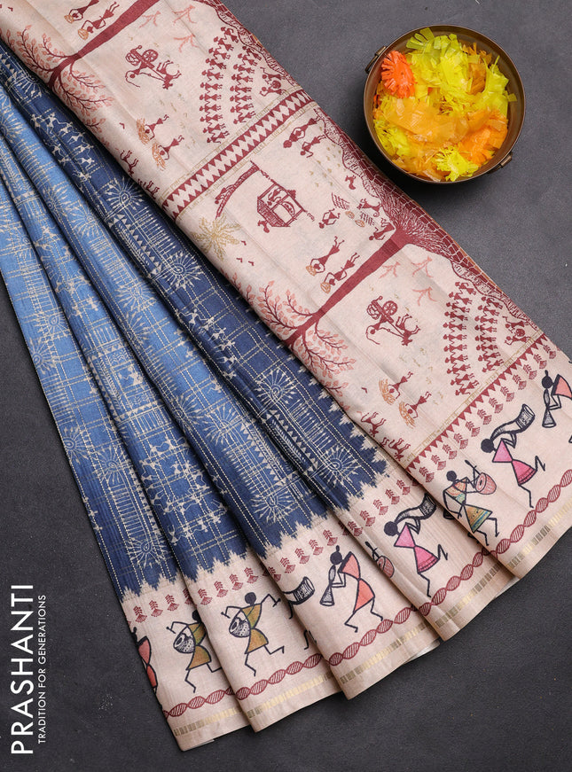 Semi tussar saree blue and cream with allover zari checks & warli prints  and printed border