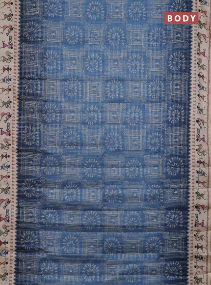 Semi tussar saree blue and cream with allover zari checks & warli prints  and printed border