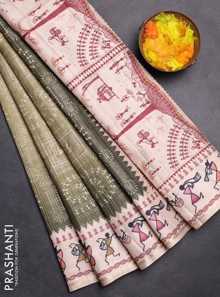 Semi tussar saree sap green and cream with allover zari checks & warli prints  and printed border